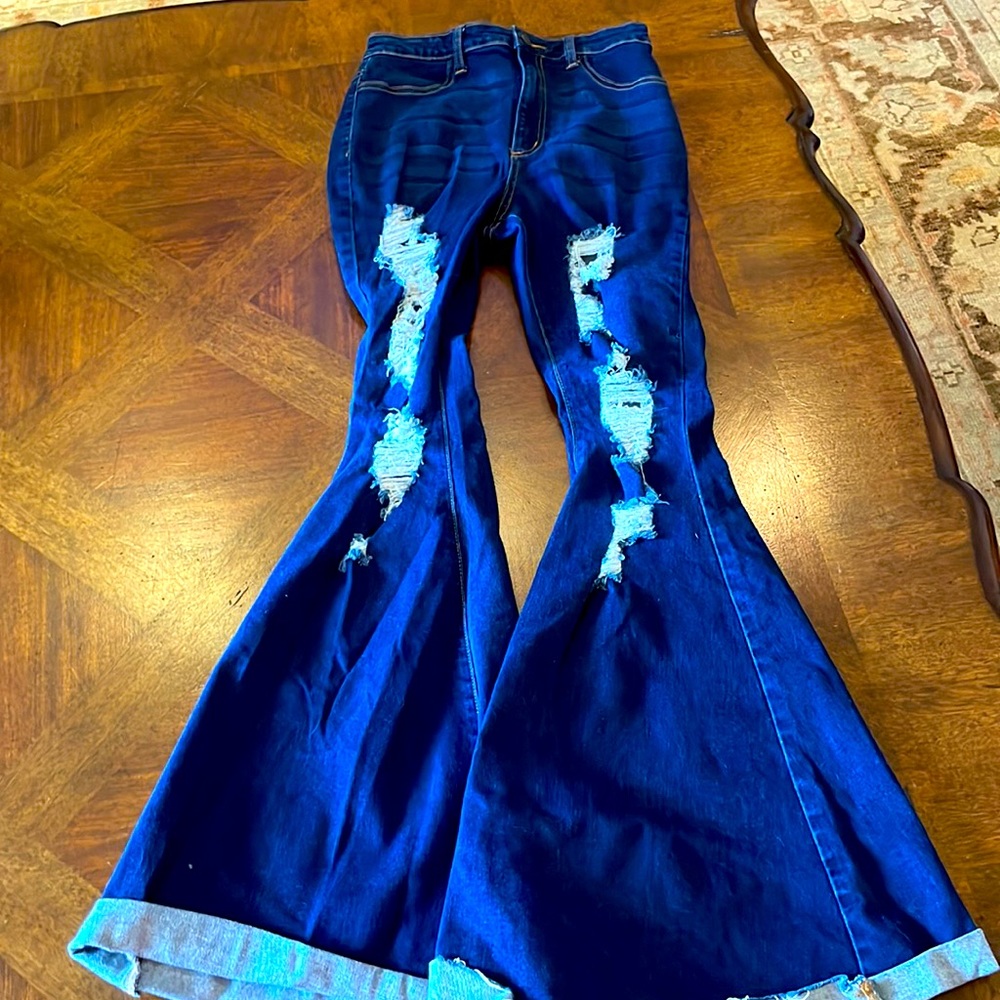 Loverly fit jeans with distressed areas, super flare leg, sz. 9